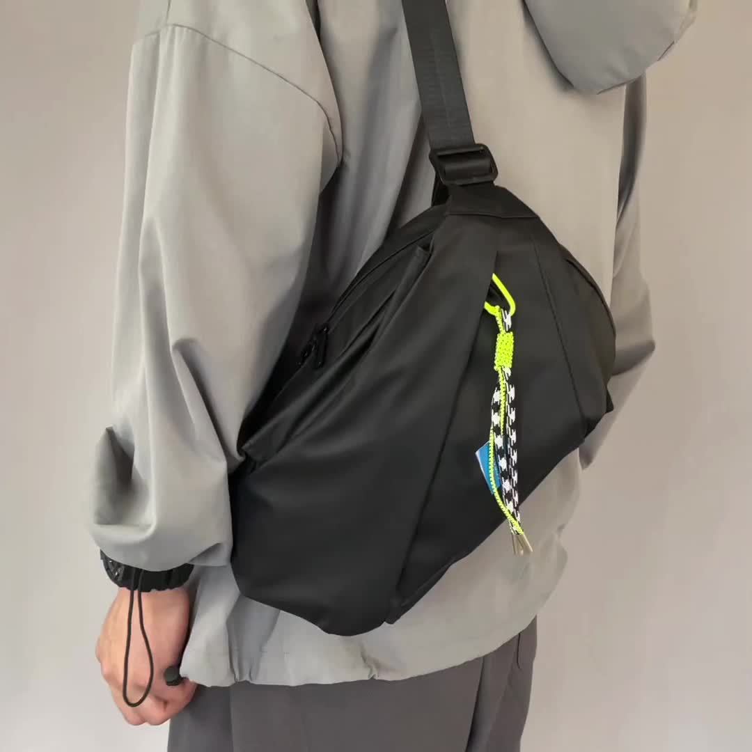 High Quality shoulder bag, high-density nylon fabric, magnetic buckle, flexible, trendy, portable water cup bag, large capacity, fashionable, Men's bag, breathable, smooth zipper, free pendant for same day shipment
